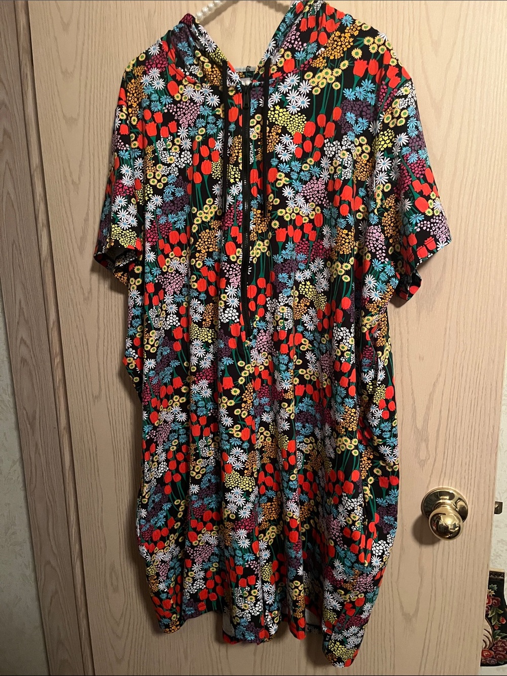 Woman’s Black Floral Hooded Romper with Multicolor Print
